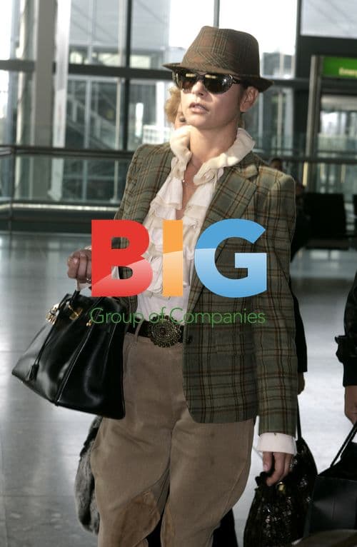 Katherine Zeta Jones Departs Heathrow