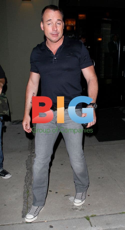 David Furnish Leaving Restaurant