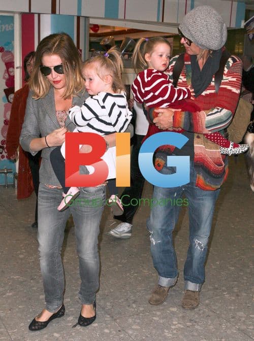 Lisa Marie Presley Arrives in London with Daughters and Boyfriend