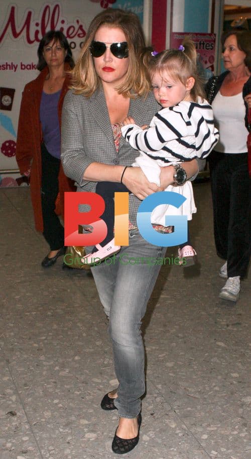 Lisa Marie Presley With Twins and Boyfriend at LAX