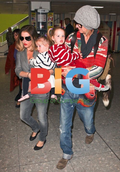 Lisa Marie Presley Arrives in London with Daughters and BF