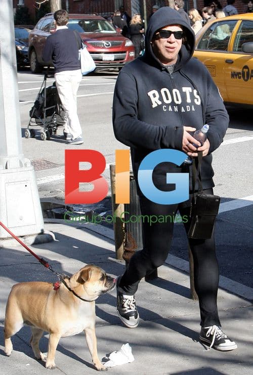 Mickey Rourke out with friend and dog