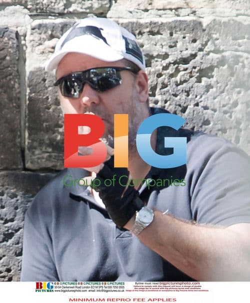 Russell Crowe Takes Cigarette Break