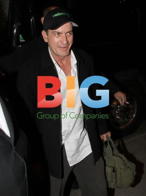 Charlie Sheen Arrives at Hotel After Oakdale Theater Show