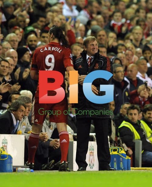 Kenny Dalglish congratulates Andy Carroll