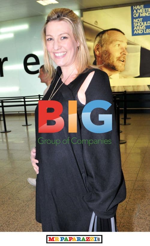 Pregnant Kelly Dalglish at Airport