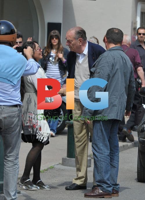 Ex-President Chirac and Maryvonne Pinault stroll in Saint Tropez