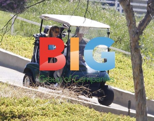 Nick Jonas and Delta Goodrem Golfing