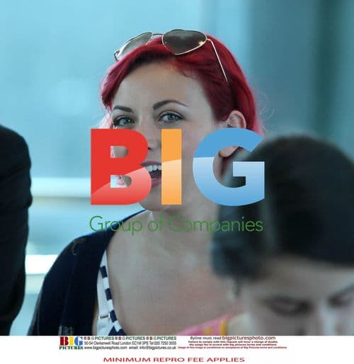 Charlotte Church Smiles at Airport with Jonathan Powell