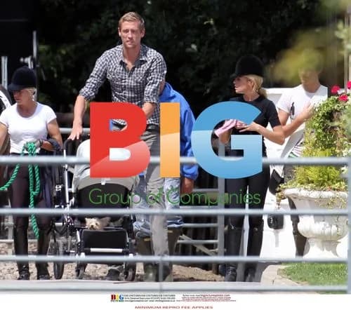 Abigail Clancy-Crouch, Peter Crouch, and daughter at stables