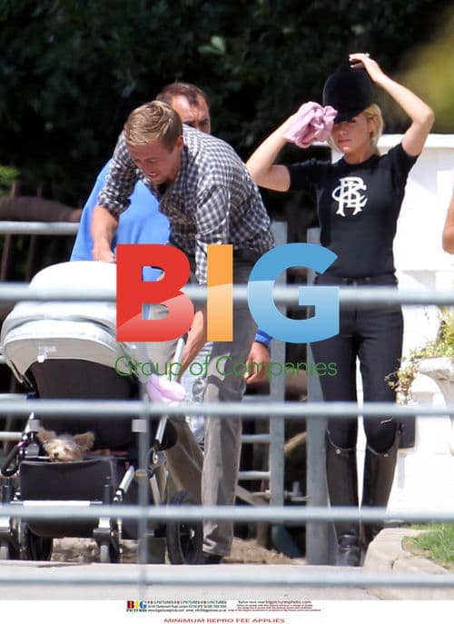 Abigail Clancy-Crouch, Peter Crouch and Daughter at Stables