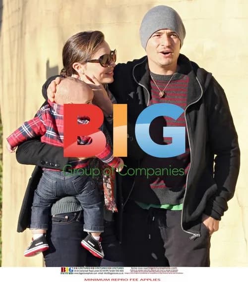 Miranda Kerr and Orlando Bloom with baby