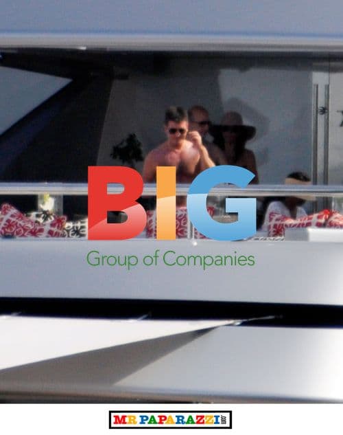 Simon Cowell Entertaining Guests on Boat in France