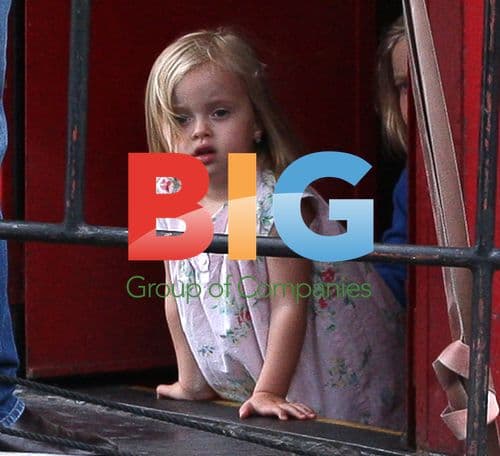 Angelina Jolie and Brad Pitt with children at Puppet theatre