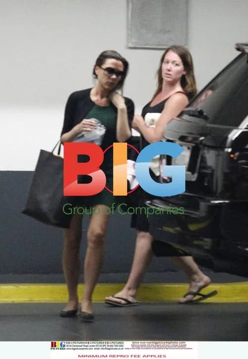 Victoria Beckham Leaves LA Office with Baby Harper
