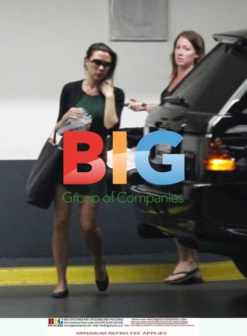 Victoria Beckham Leaves Office with Baby Harper