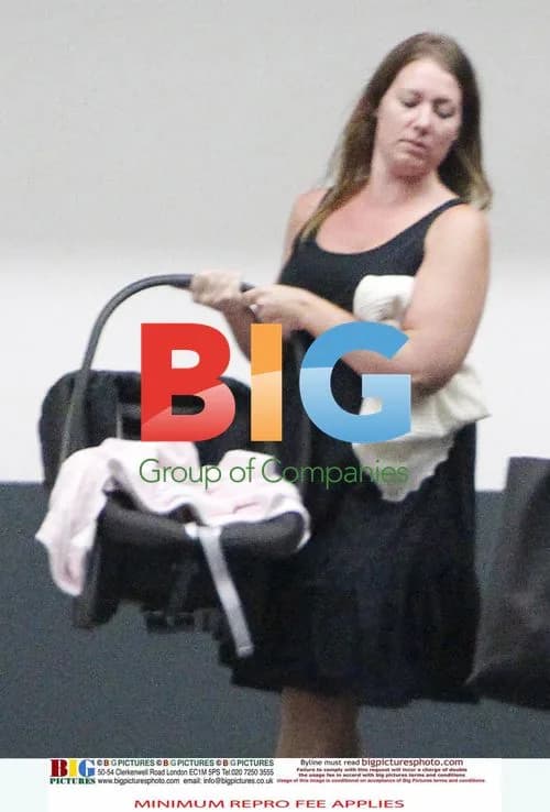 Victoria Beckham Leaving LA Office with Baby Harper