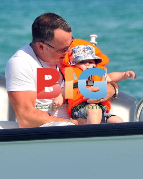 Elton John and Family at Club 55