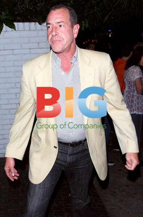 Michael Lohan arrives with mystery woman