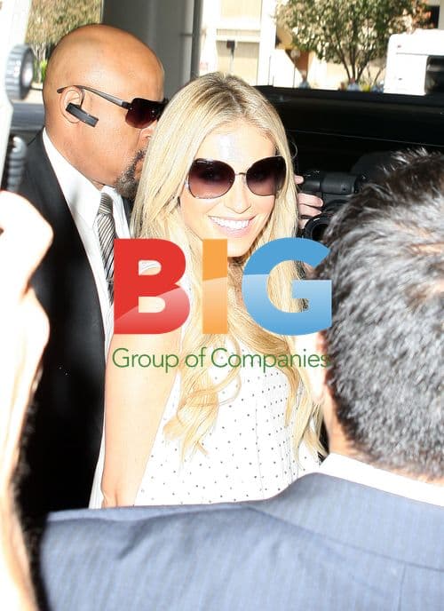 Robbie and Claudine Keane arrive at LAX