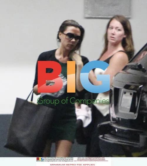 Victoria Beckham Leaves LA Office with Baby Harper