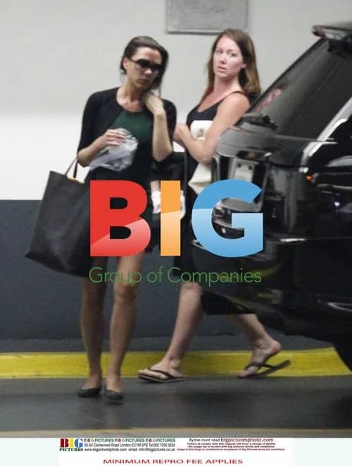 Victoria Beckham with baby Harper