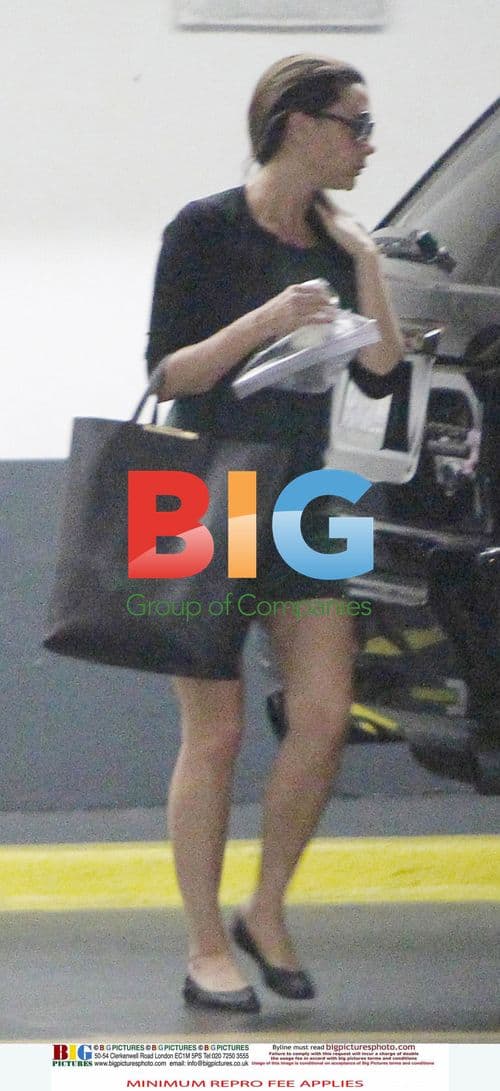 Victoria Beckham Leaves LA Office with Baby Harper