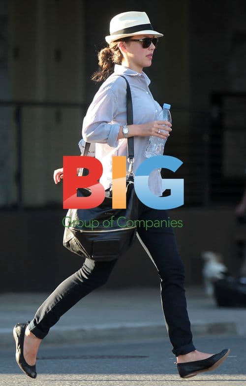 Zoe Buckman Hurries Across Street in New York