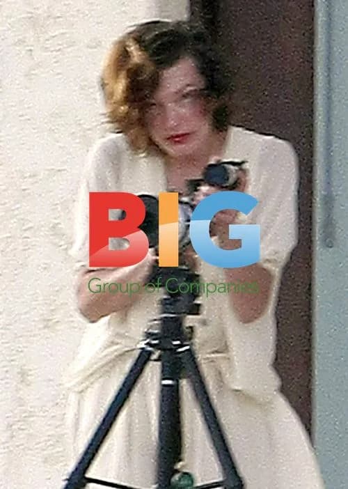 Milla Jovovich Toasts Champagne with Husband in Mexico