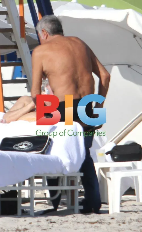 Roberto Cavalli and Girlfriend at Miami Beach