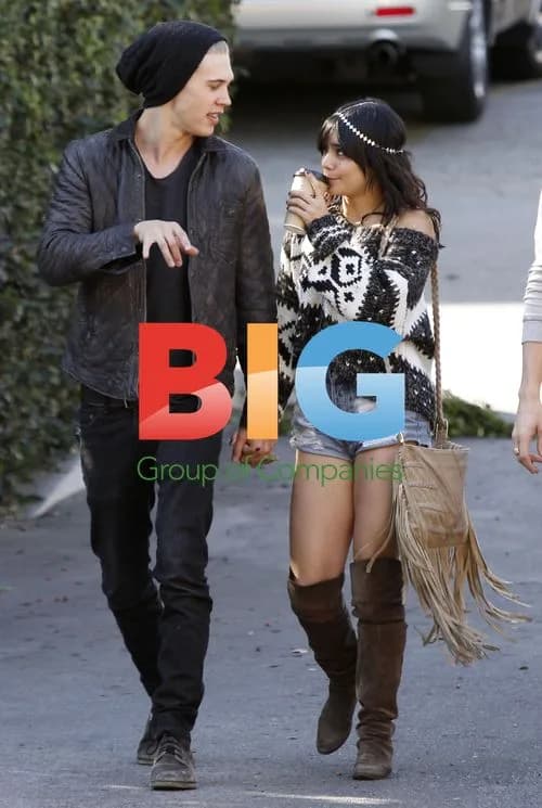 Vanessa Hudgens and Austin Butler hold hands