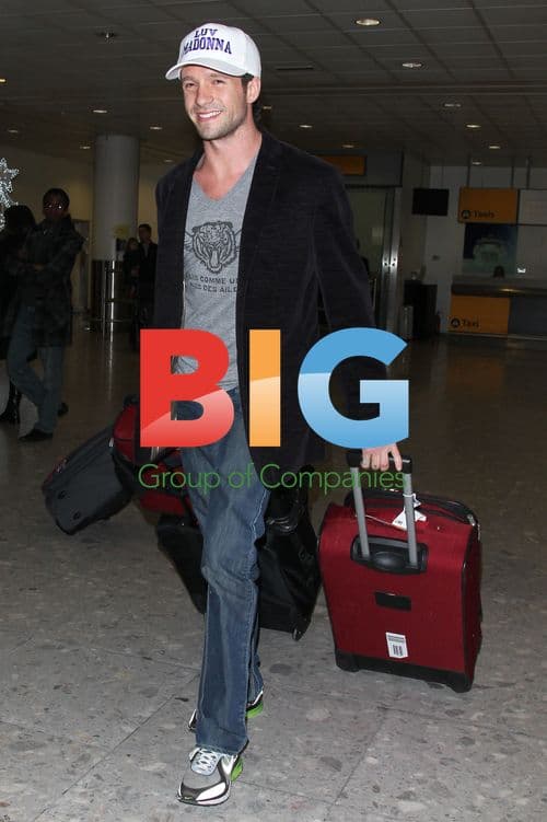 Jason Dottley Arrives at Heathrow After Divorce