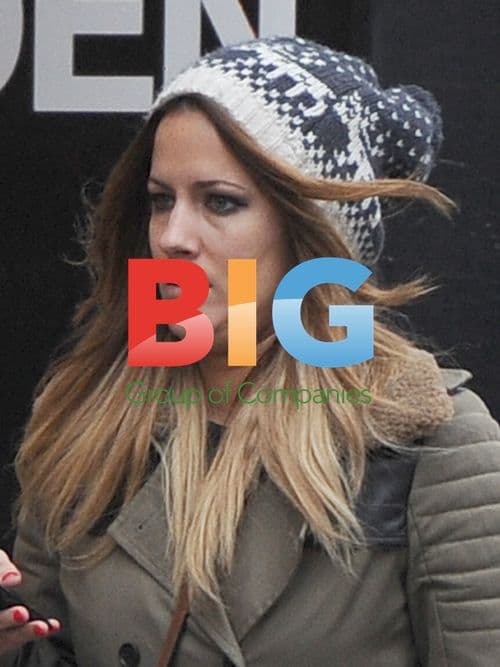 Caroline Flack Spotted in London Rain