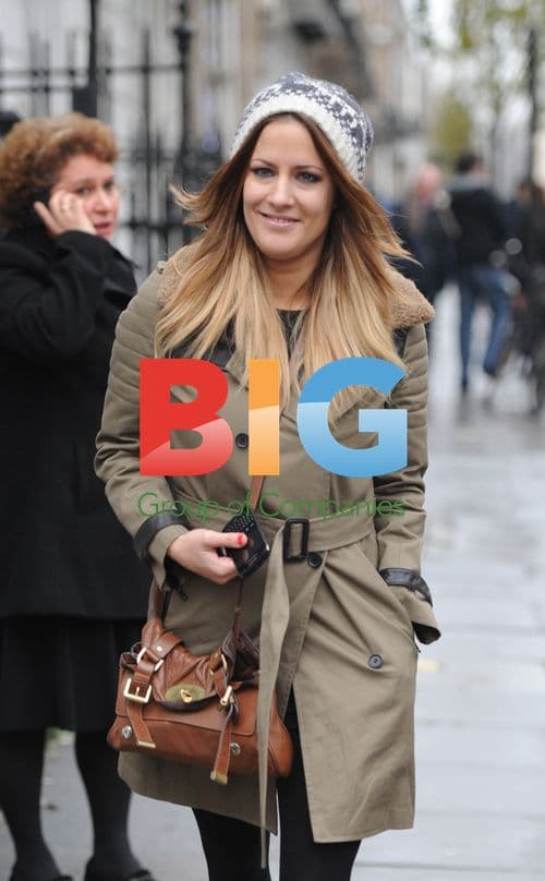 Caroline Flack Out in London Rain