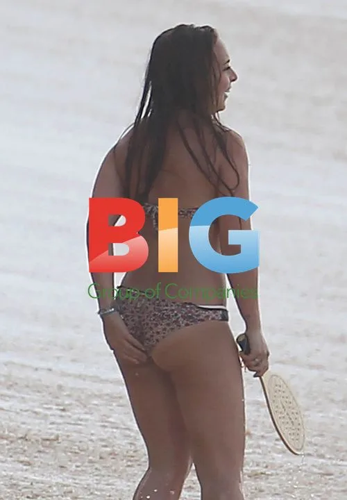 Chloe Green plays beach tennis in Caribbean