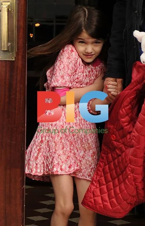 Tom Cruise and daughter Suri leaving hotel in NYC
