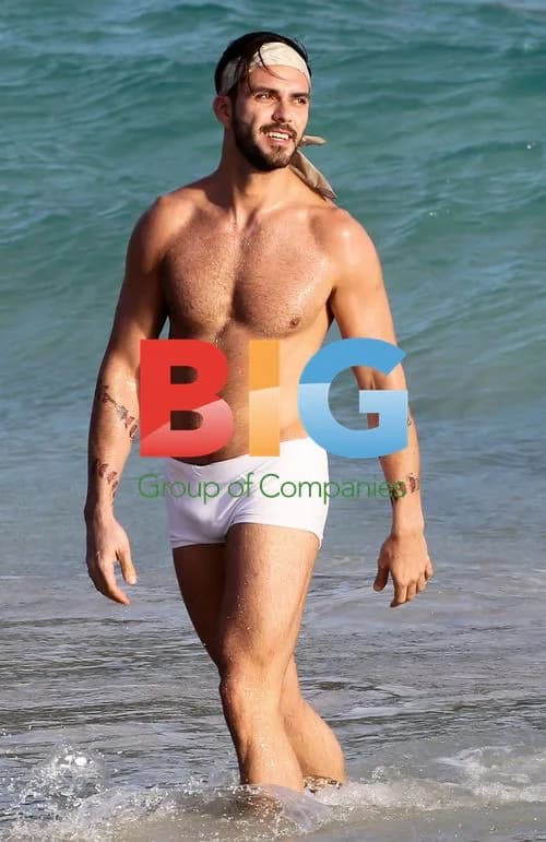 Designer Marc Jacobs and friend on beach