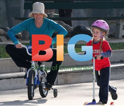 Marcia Cross Rides Daughter's Bike in Park