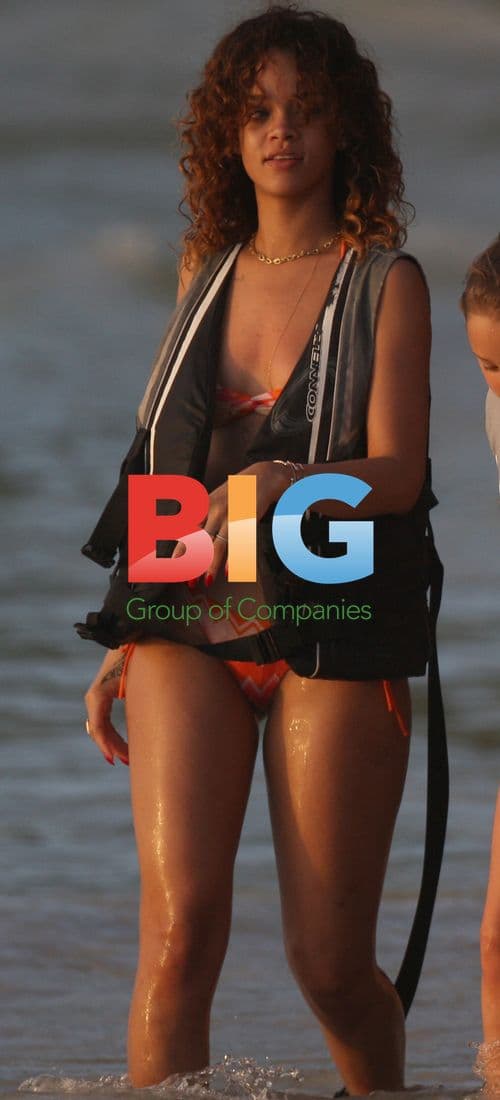 Rhianna Splashing in the Caribbean