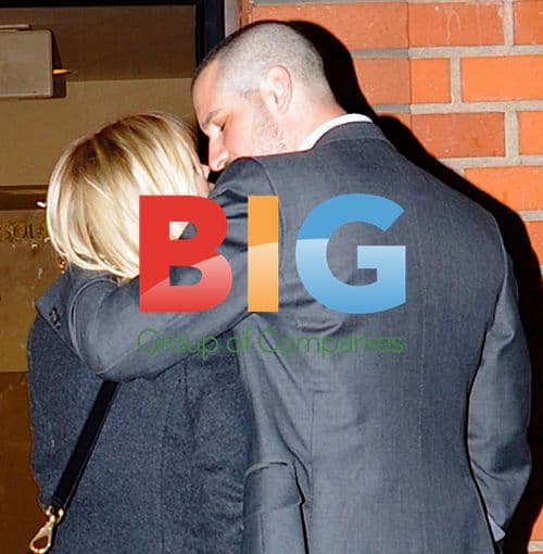 Reese Witherspoon and Jim Toth leaving restaurant