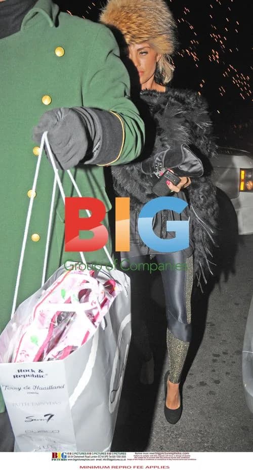 Katie Price out with aide in London
