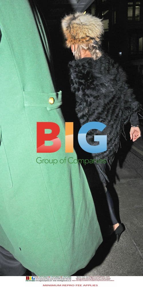 Katie Price Seen With Personal Aid In London