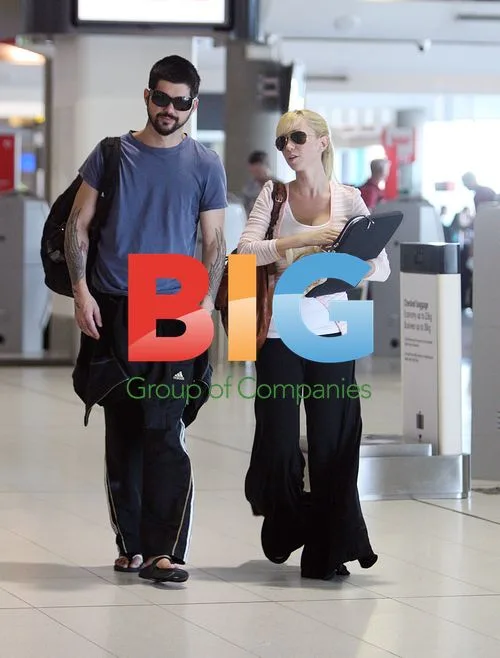 J.D. Fortune and INXS Depart Perth Airport