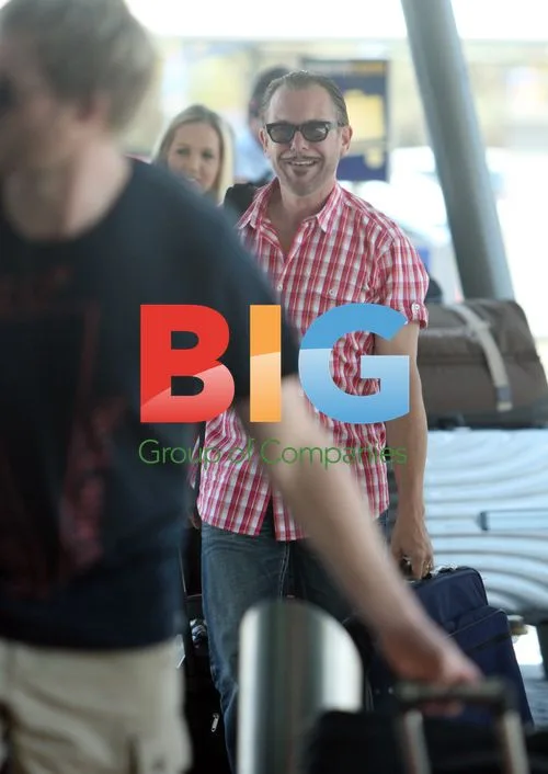 J.D. Fortune and INXS Depart Perth Airport