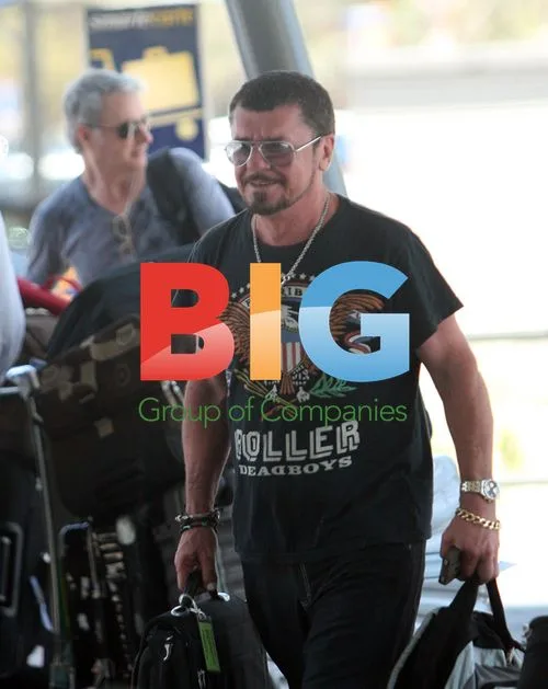 J.D. Fortune and INXS Depart Perth Airport