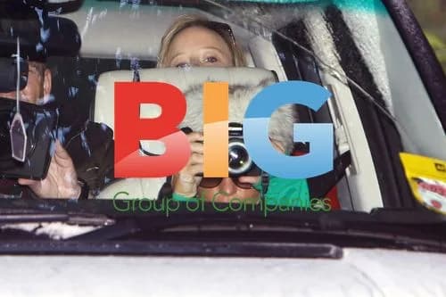 Katie Price leaves home, films paparazzi