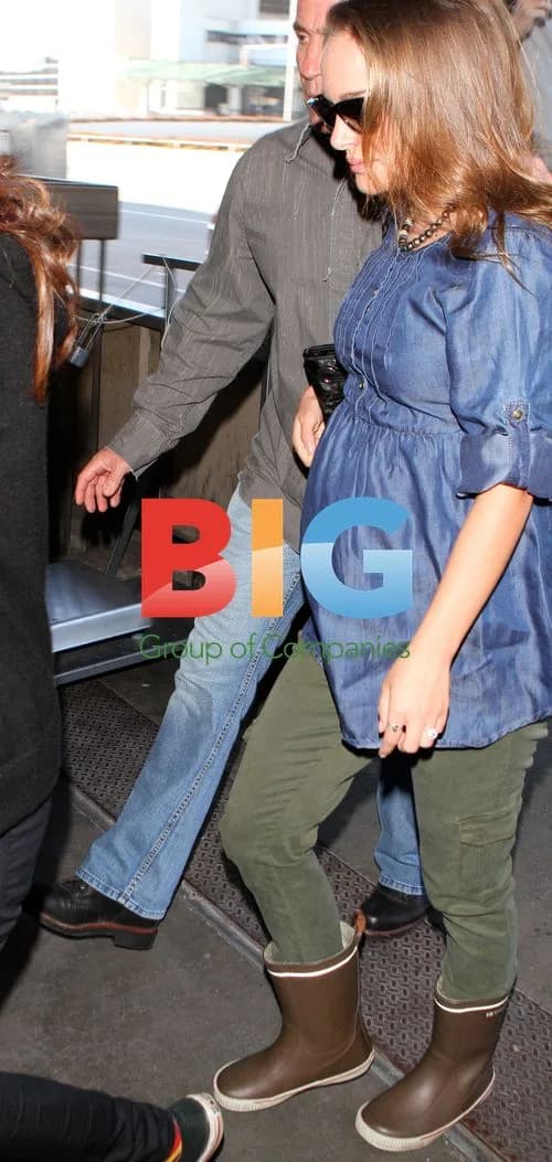 Natalie Portman at LAX in Rainboots