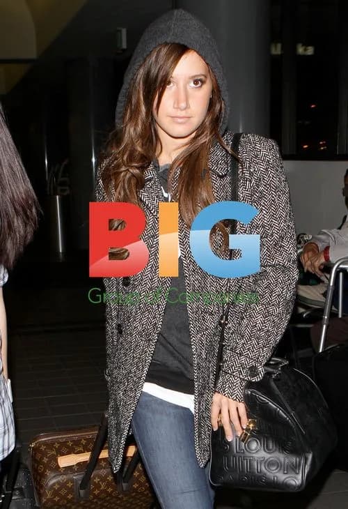 Ashley Tisdale at LAX 10/02/2011