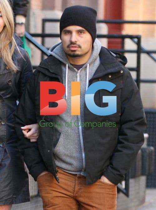 Michael Pena with female friend in Soho