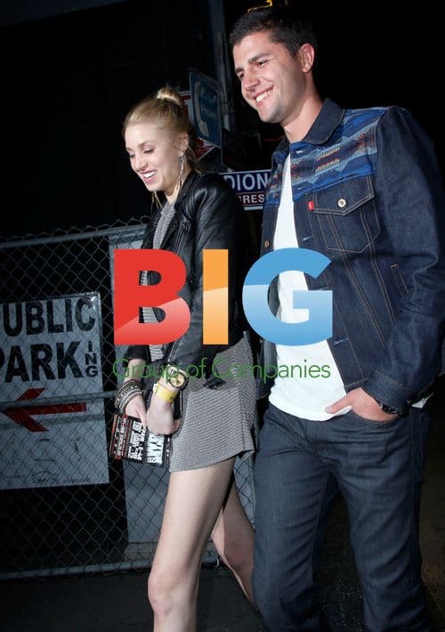 Whitney Port and Ben Nemtin leaving music event